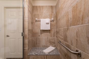 Upgraded bathroom fixtures & tiled showers